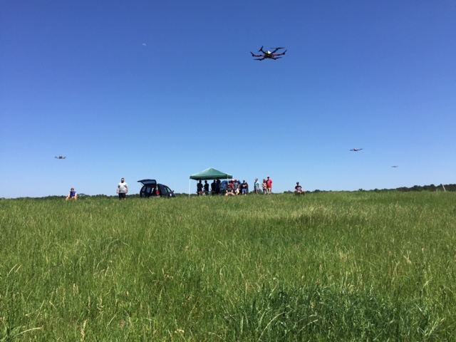 Students flying drones at Louisiana Tech farm as part of UAV Control class
